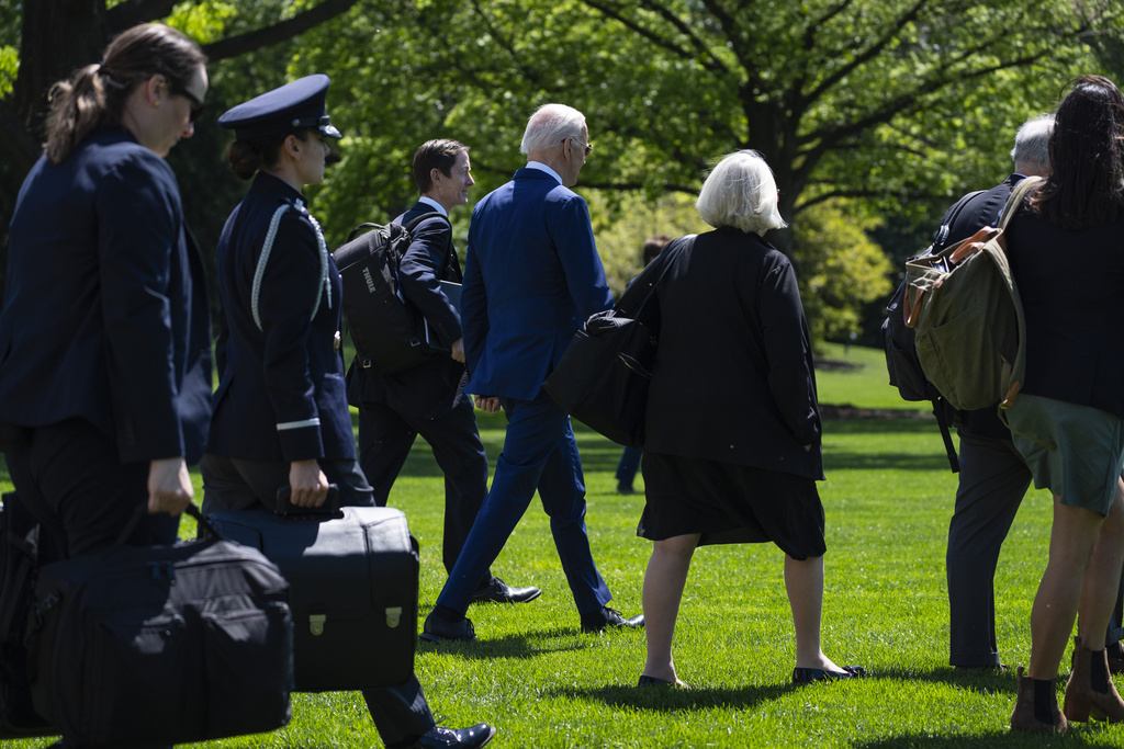 White House Staff Try To Hide Biden’s Halting Gait With Crowds Of Staffers