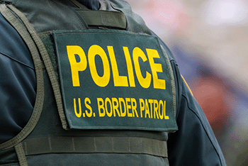 Border Agent Wrongly Accused of Violence Gets Just Reward